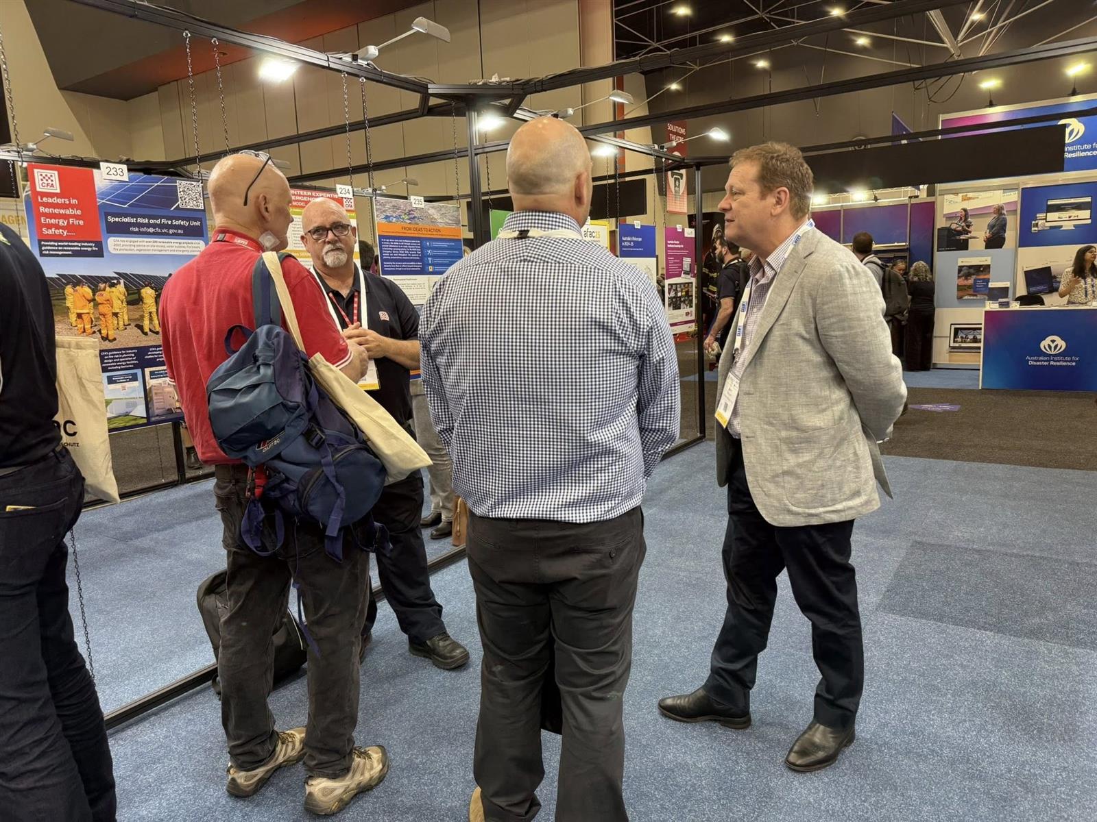 Brett Boatman and Matt Allen discussing their poster presentations at AFAC